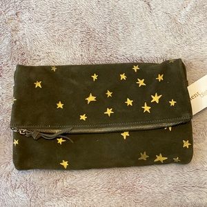 Dark green clutch with gold stars